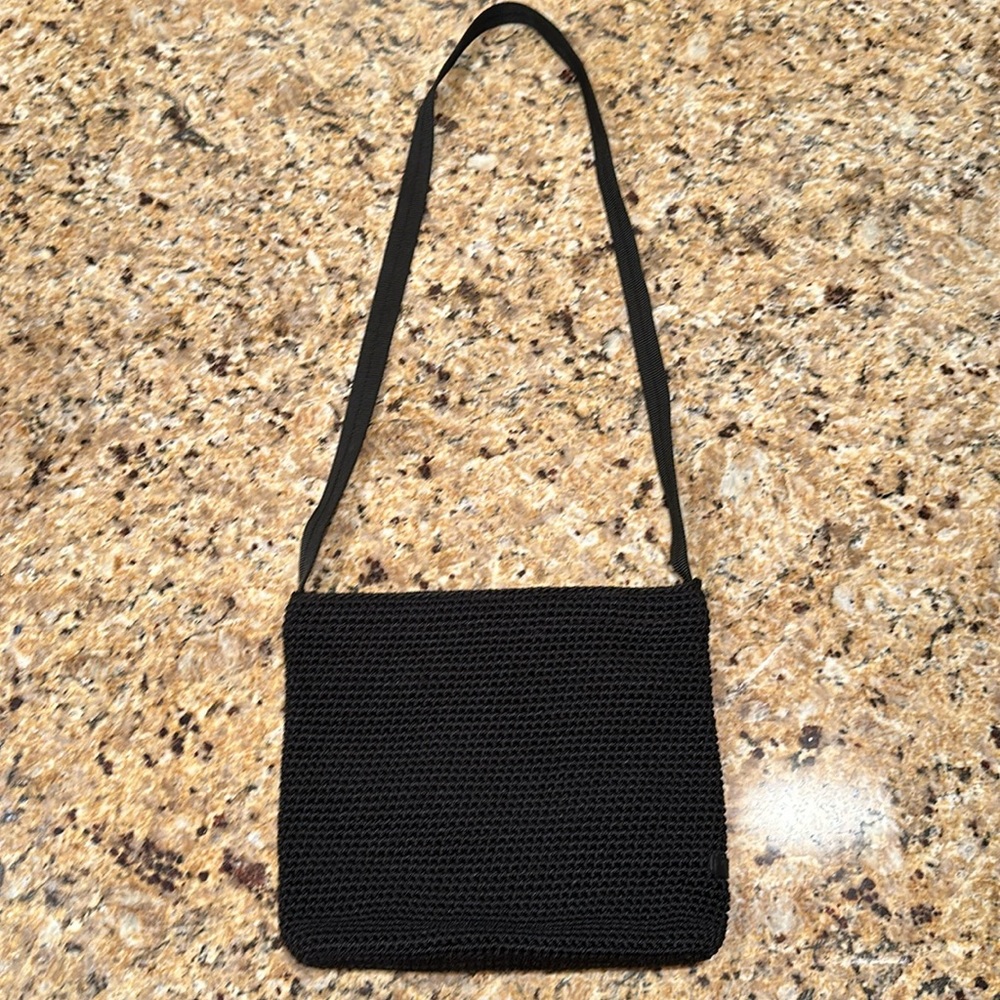 The Sak purse in excellent condition. Black